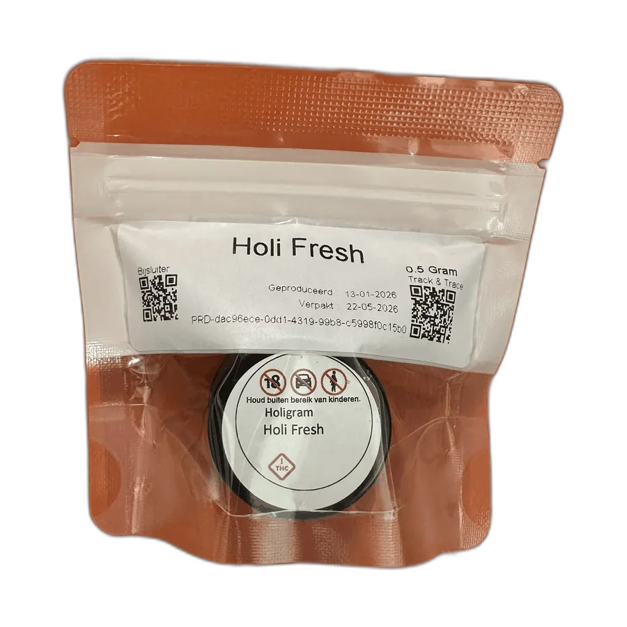 Een Holigram Holi Fresh-eenheid: recyclebare PET-verpakking met zwart glazen potje binnenin, gefotografeerd op een oranje achtergrond.